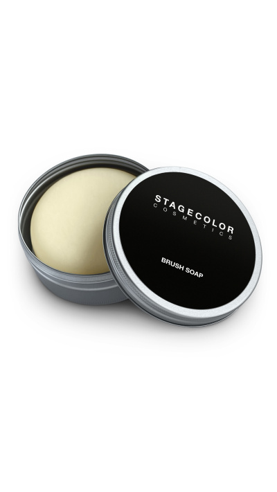 brush soap in a container on white background